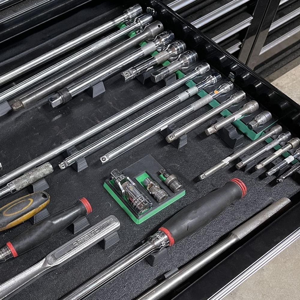 A toolbox drawer organized with MagAttach extension trays, ratchet holders and supports